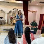 A speaker presents during a Saraswati Puja for high school graduates on Aug. 10, 2024 at the Hindu Temple of Fresno.